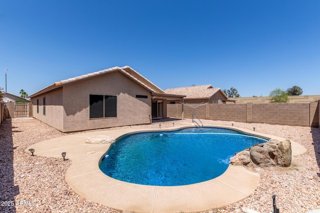 9243 W Brown St, Peoria, AZ 85345 - view of swimming pool featuring a fenced backyard and a patio