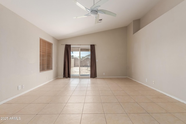 9243 W Brown St, Peoria, AZ 85345 - spare room with lofted ceiling, light tile patterned floors, ceiling fan, and baseboards
