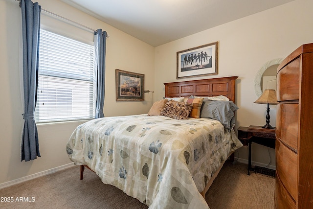 carpeted bedroom with baseboards