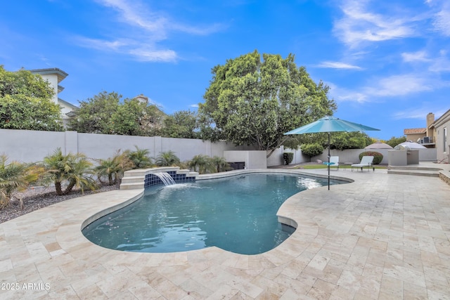 view of pool with a fenced in pool, a fenced backyard, and a patio area