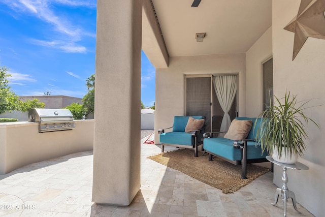 view of patio / terrace with area for grilling and exterior kitchen