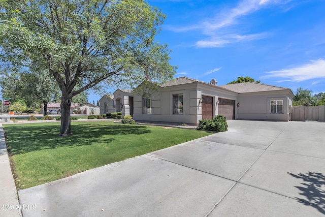 ranch-style house with a tiled roof, driveway, a front yard, a garage, and fence