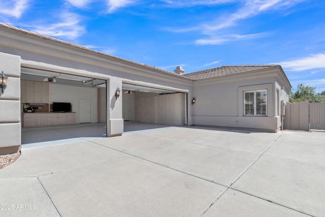 exterior space featuring concrete driveway
