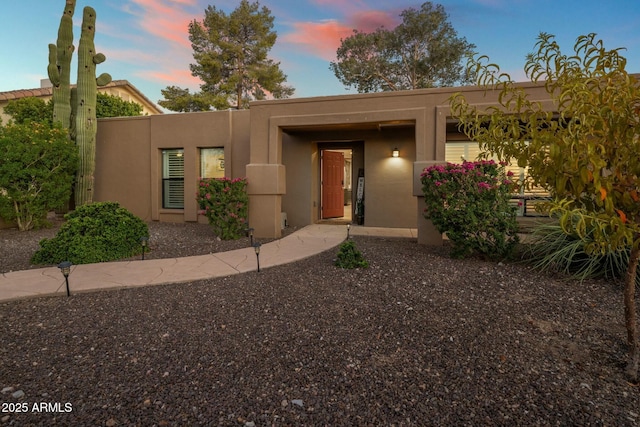 view of pueblo revival-style home