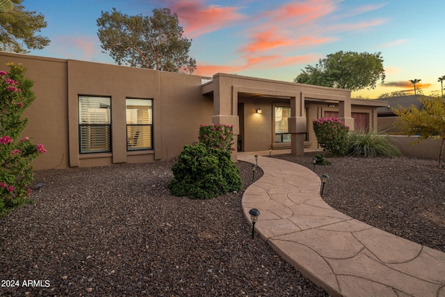 view of pueblo revival-style home