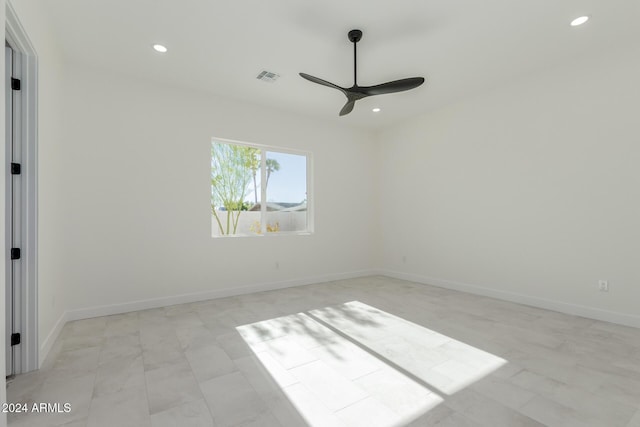 spare room featuring ceiling fan