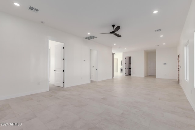 unfurnished room with ceiling fan