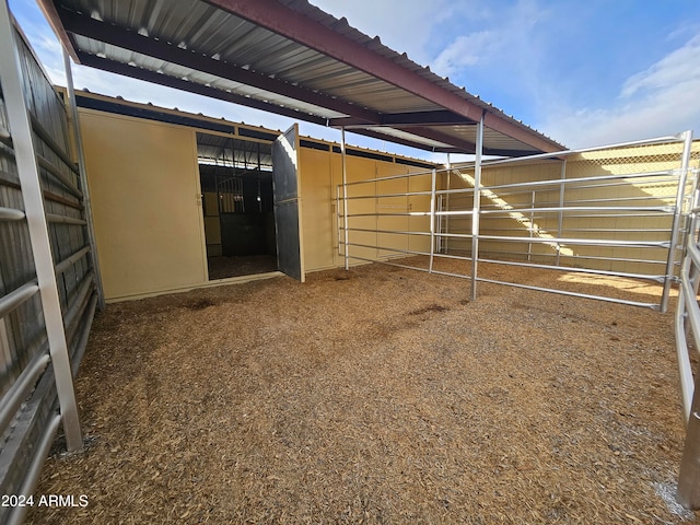 view of stable with an outdoor structure
