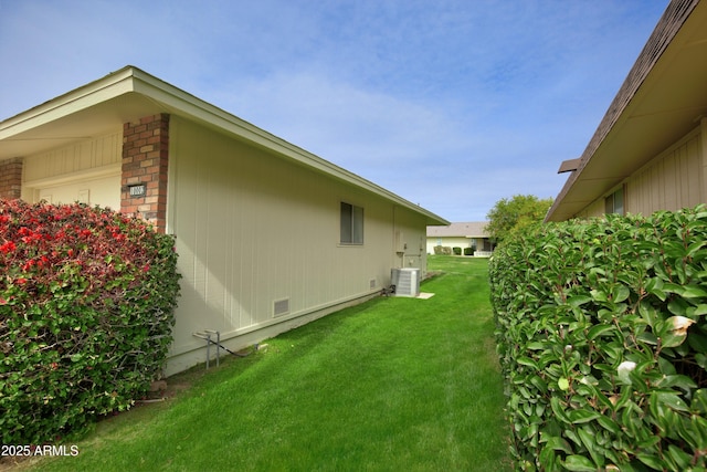 view of yard with visible vents and cooling unit