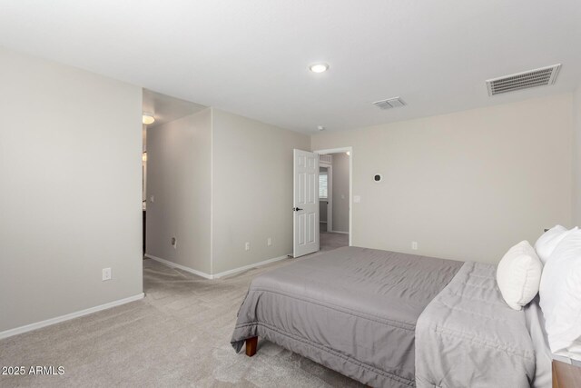 bedroom featuring visible vents, baseboards, and carpet flooring
