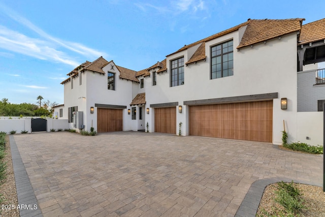 view of front of property with a garage