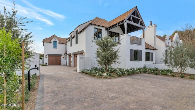 view of front of property with a garage