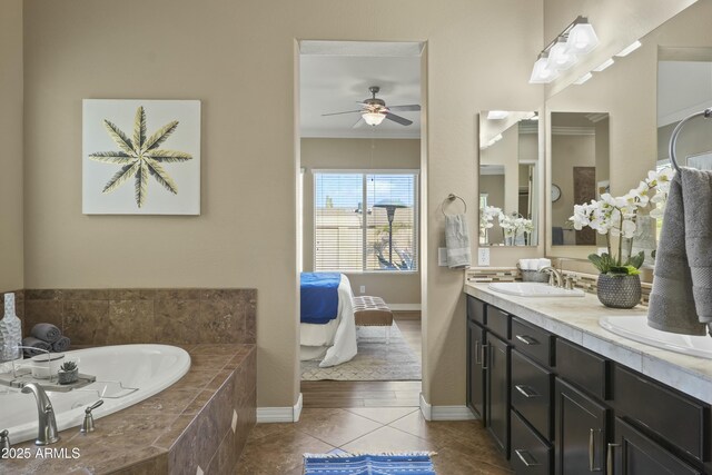 spare room with ceiling fan, ornamental molding, a wealth of natural light, and dark hardwood / wood-style floors