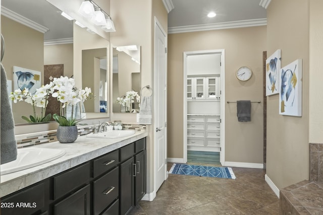 bathroom with tasteful backsplash, vanity, and ornamental molding