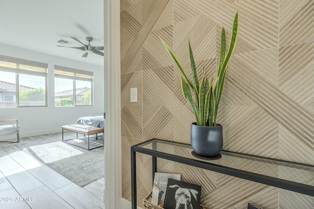 hallway with tile patterned floors