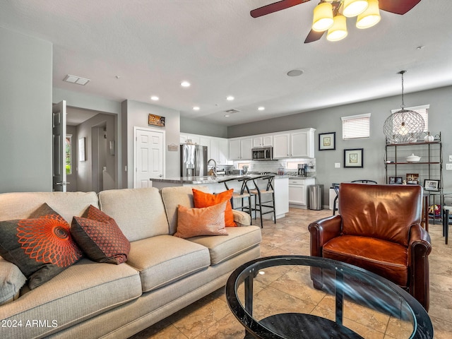 living room featuring ceiling fan