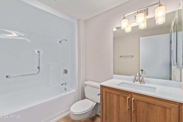 full bathroom with vanity, toilet, and  shower combination