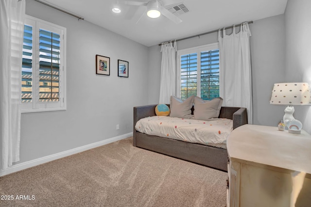 carpeted bedroom with ceiling fan