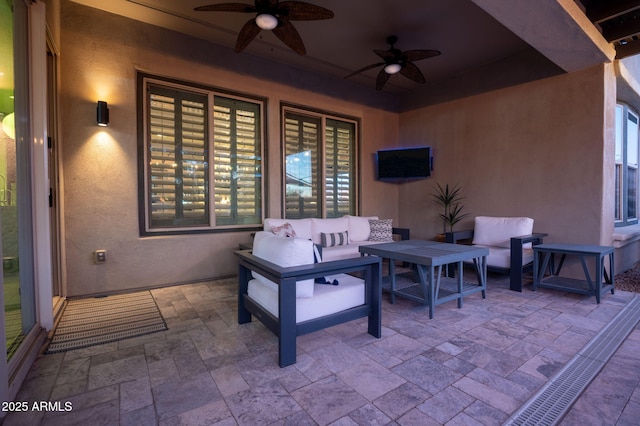 view of patio featuring ceiling fan and an outdoor hangout area