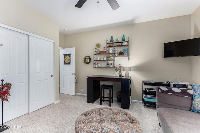 living room with light carpet and ceiling fan