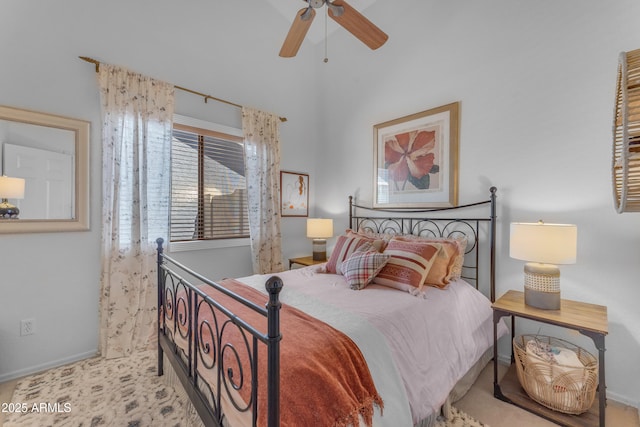 bedroom with a ceiling fan and baseboards