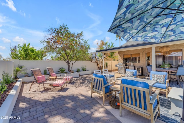 view of patio / terrace featuring outdoor lounge area and a fenced backyard