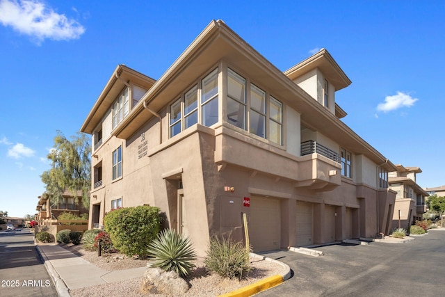 view of property featuring a garage