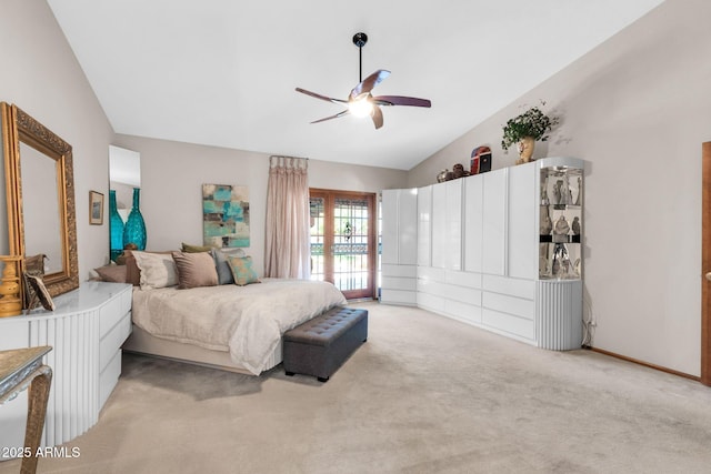 bedroom featuring access to exterior, carpet flooring, ceiling fan, and vaulted ceiling