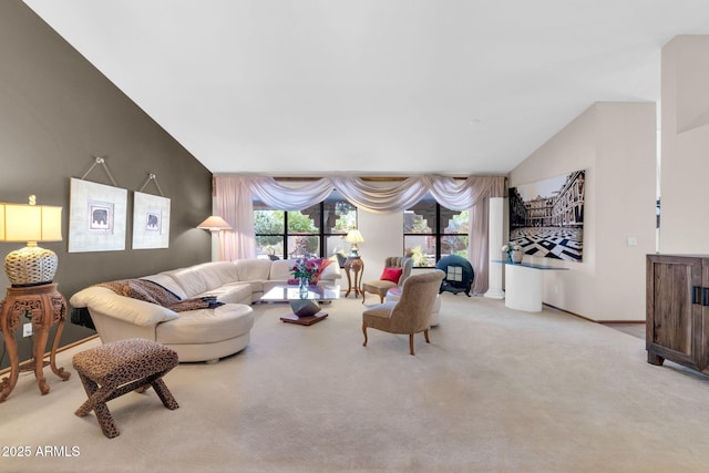 carpeted living room with baseboards and vaulted ceiling