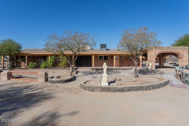 view of front of house with a patio area