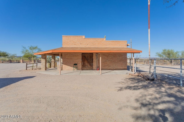 rear view of property with a patio area