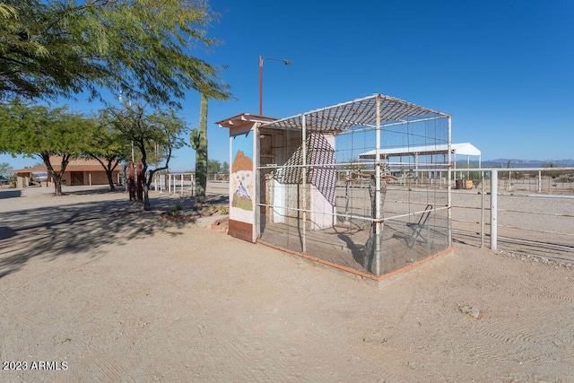 exterior space featuring an outdoor structure