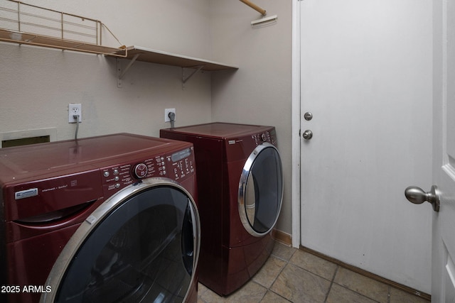 4753 E Bighorn Ave, Phoenix, AZ 85044 - clothes washing area with separate washer and dryer and baseboards