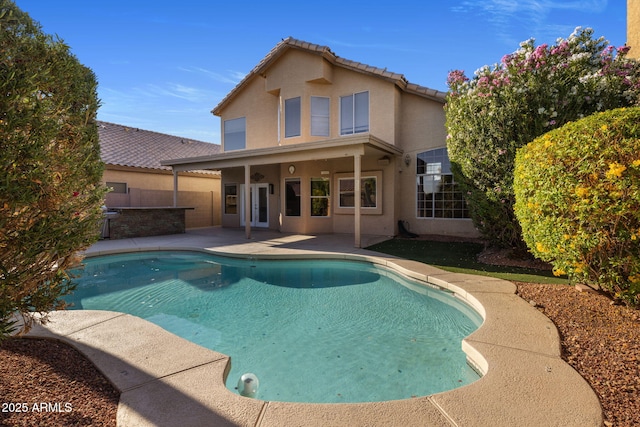 4753 E Bighorn Ave, Phoenix, AZ 85044 - rear view of house with a patio, stucco siding, and fence