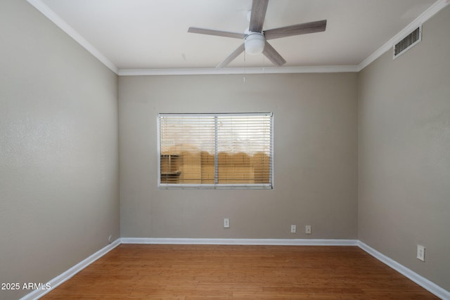 4753 E Bighorn Ave, Phoenix, AZ 85044 - spare room featuring ceiling fan, crown molding, wood finished floors, and baseboards