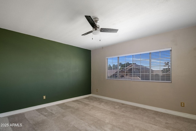 4753 E Bighorn Ave, Phoenix, AZ 85044 - carpeted spare room featuring baseboards and a ceiling fan