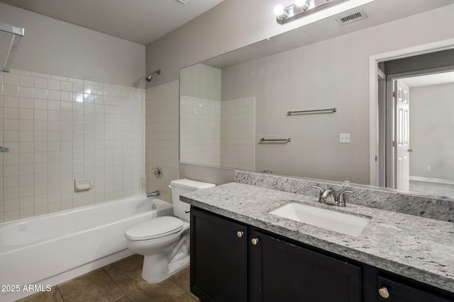 4753 E Bighorn Ave, Phoenix, AZ 85044 - bathroom featuring tile patterned flooring, toilet, shower / tub combination, and vanity