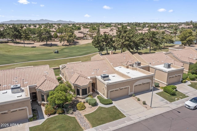 8431 W Utopia Rd, Peoria, AZ 85382 - aerial perspective of suburban area featuring a local golf course and mountains