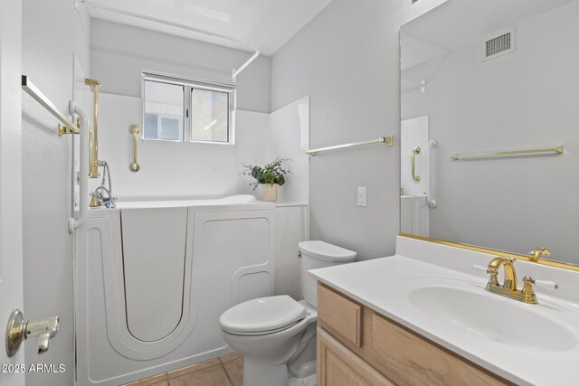 8431 W Utopia Rd, Peoria, AZ 85382 - bathroom featuring vanity and tile patterned flooring