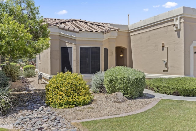 8431 W Utopia Rd, Peoria, AZ 85382 - back of property with stucco siding and a tiled roof