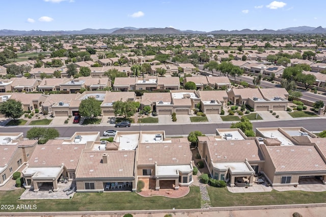 8431 W Utopia Rd, Peoria, AZ 85382 - aerial perspective of suburban area featuring a mountainous background