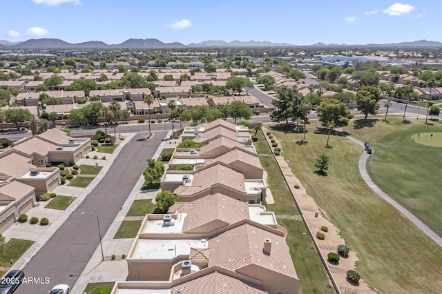 8431 W Utopia Rd, Peoria, AZ 85382 - aerial perspective of suburban area with a mountain backdrop and a golf course