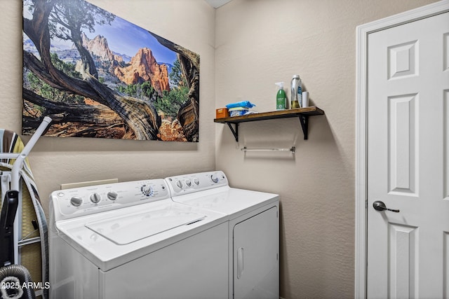 washroom featuring washer and dryer