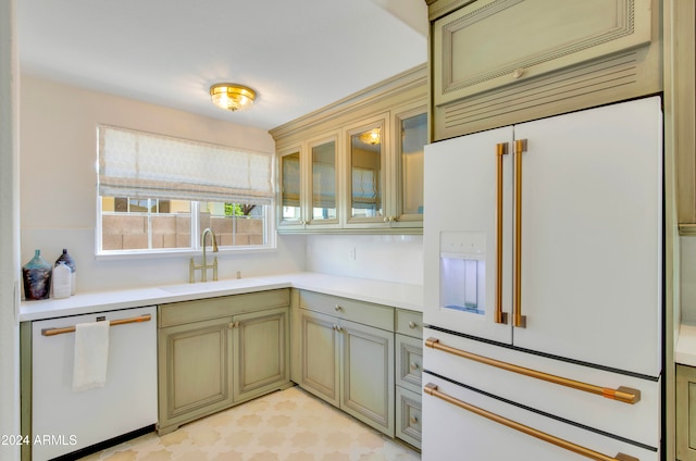 kitchen with sink and white appliances