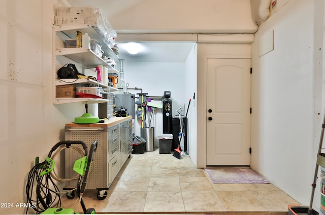 interior space with light tile patterned floors