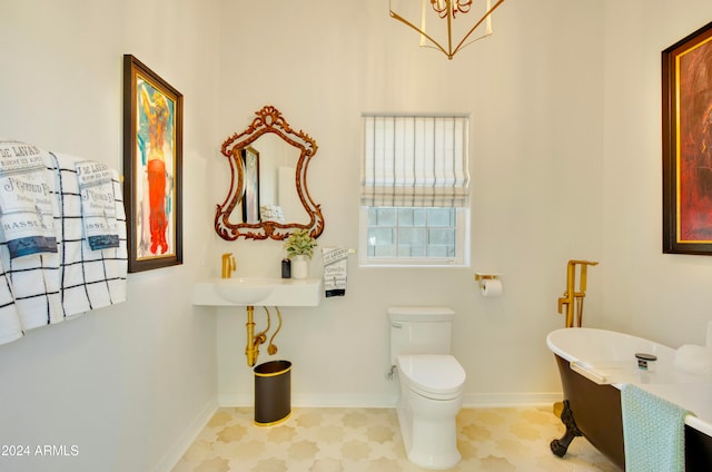 bathroom with toilet and a tub