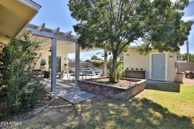 view of yard featuring a patio and a pergola