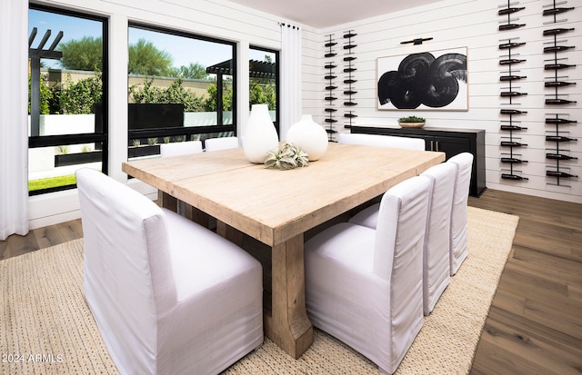 dining room with wood-type flooring