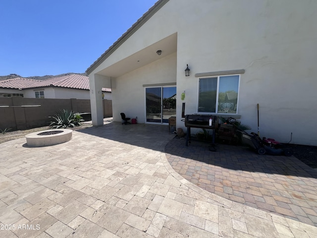 514 E Pearce Rd, Phoenix, AZ 85042 - view of patio featuring fence and a fire pit
