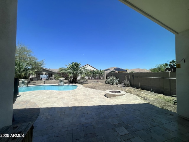 514 E Pearce Rd, Phoenix, AZ 85042 - view of swimming pool featuring a patio, an outdoor fire pit, and a fenced backyard